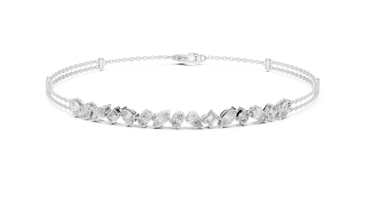 Claw-set pear, oval, marquise and emerald lab-grown diamond bracelet in white gold by THE LAB Jewellers