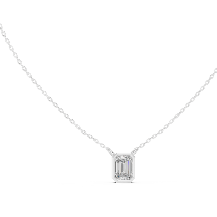 Bezel set emerald cut lab-grown diamond pendant, front view, in white gold by THE LAB Jewellers