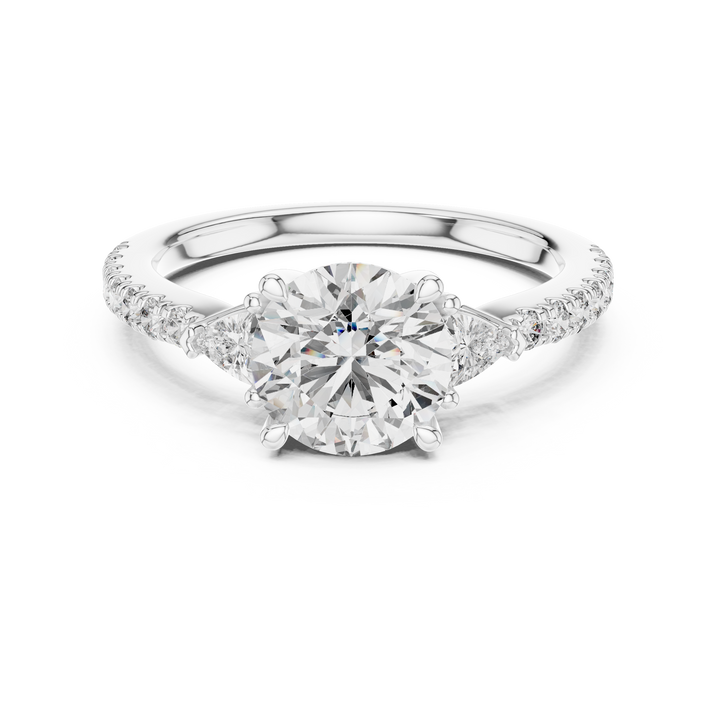Round brilliant trilogy ring with trillion sides in white gold by THE LAB Jewellers